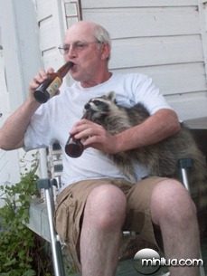 This-is-my-uncle-from-Idaho-drinking-a-beer-with-his-pet-raccoon-named-Mr-T